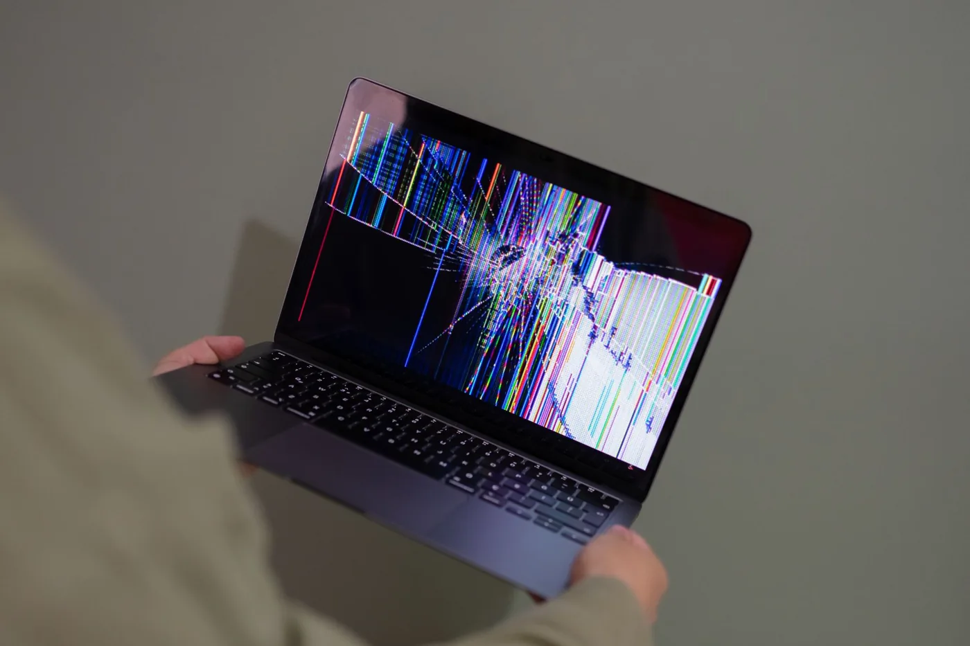 A laptop screen displaying a 404 error page, representing a broken short link that needs to be fixed