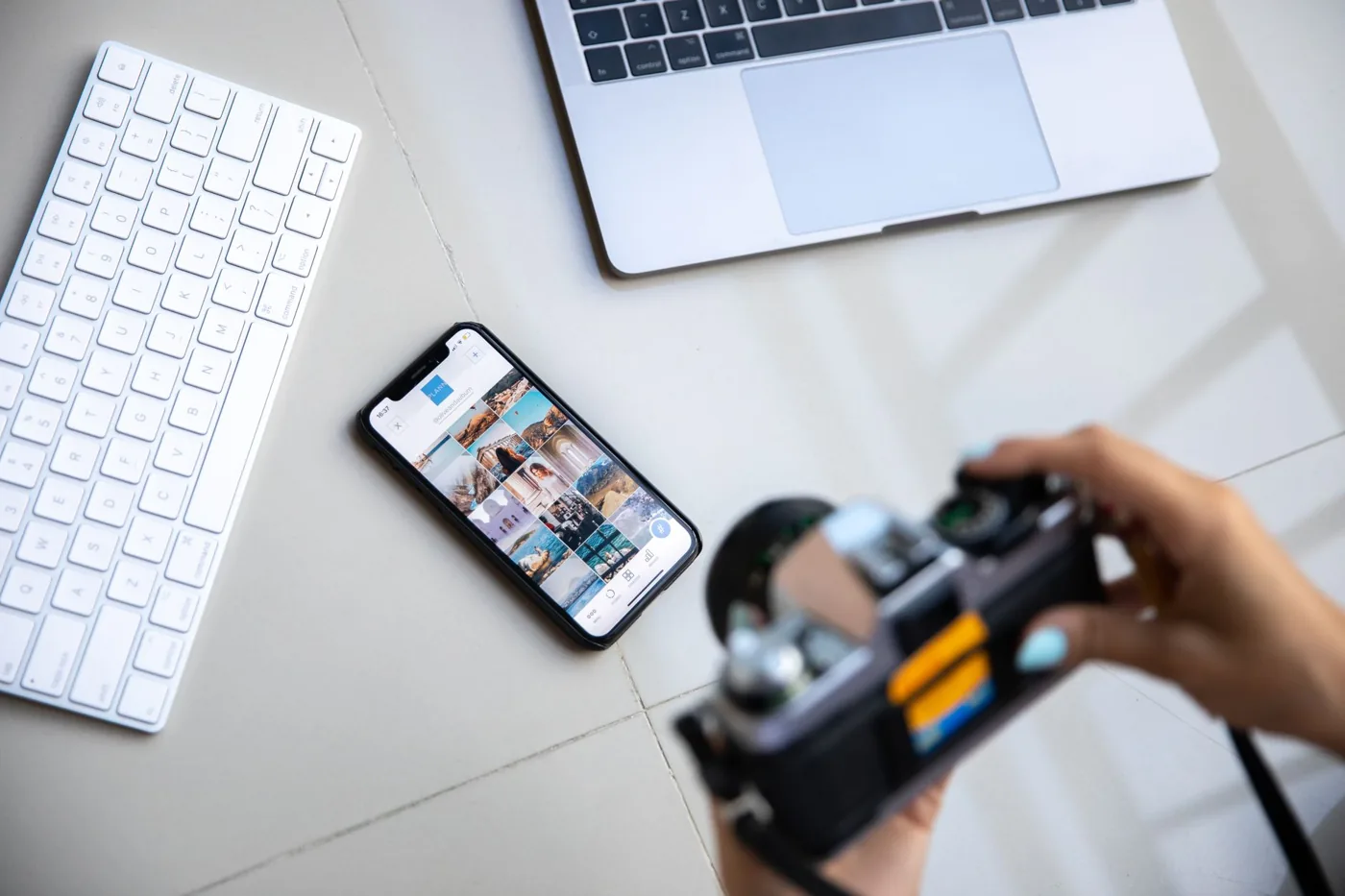 A smartphone displaying a clean link-in-bio page with multiple destination links for a content creator